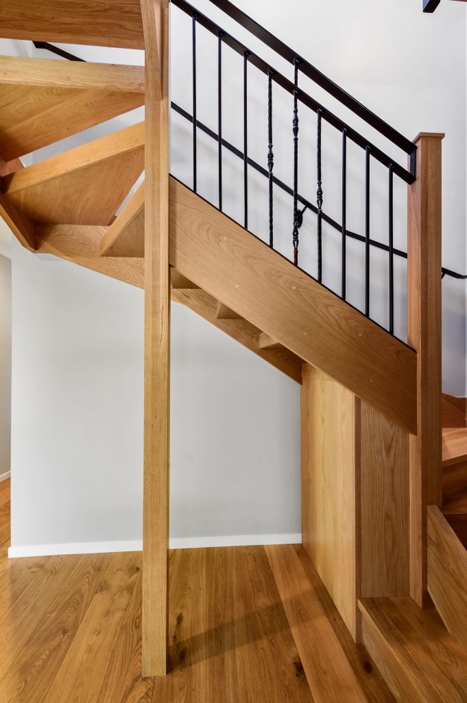 timber staircase with metal balustrades